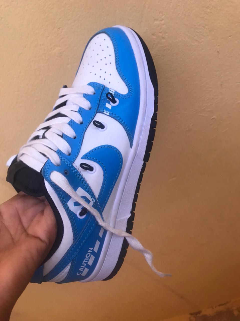 TÊNIS DA NIKE 